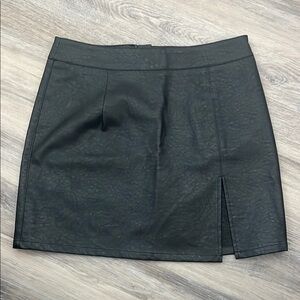 Black mini pencil skirt with slit for cocktail occasions